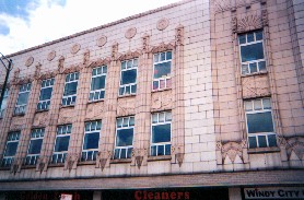 Deco Arts Bldg., aka Ritz Garage, a car dealership of the 1920s at Lake Park and 55th with wonderful terra cotta references to auto parts. It fought demolition successfully and is now a fine anchor. Ossewaarde