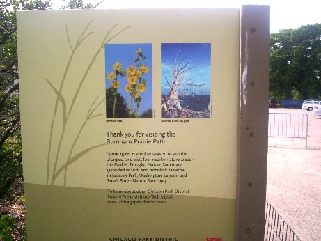 Exit thank you sign showing compass plant, icesickles and gullls