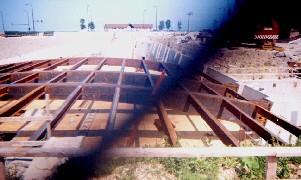 As the exhibit roof is laid at ground level
