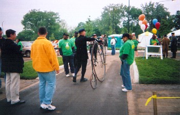 High cyclist in turn of century garb