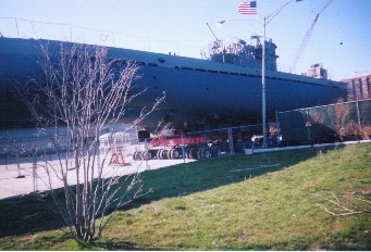 Views of the sub as it is brought out and rouds the corners of the Museum