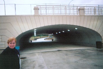 Looking through 59th underpass from east, railing partly installed