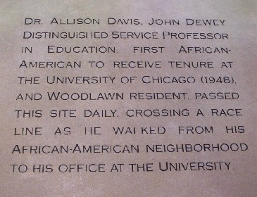 Plaque in Davis Garden Washinton Park noting that Davis crossed this racial barrier daily as the first tenured professor at the U of C