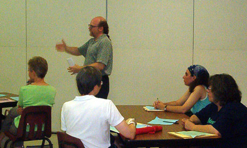 Transit Task Force chairman James Withrow leads the August 25 2004 bus workshop